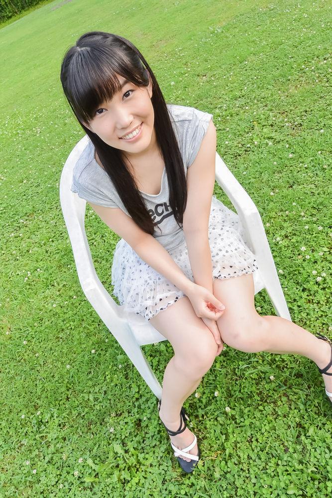 Japanese girl Yui Kasugano is masturbated with sex toys on a backyard chair