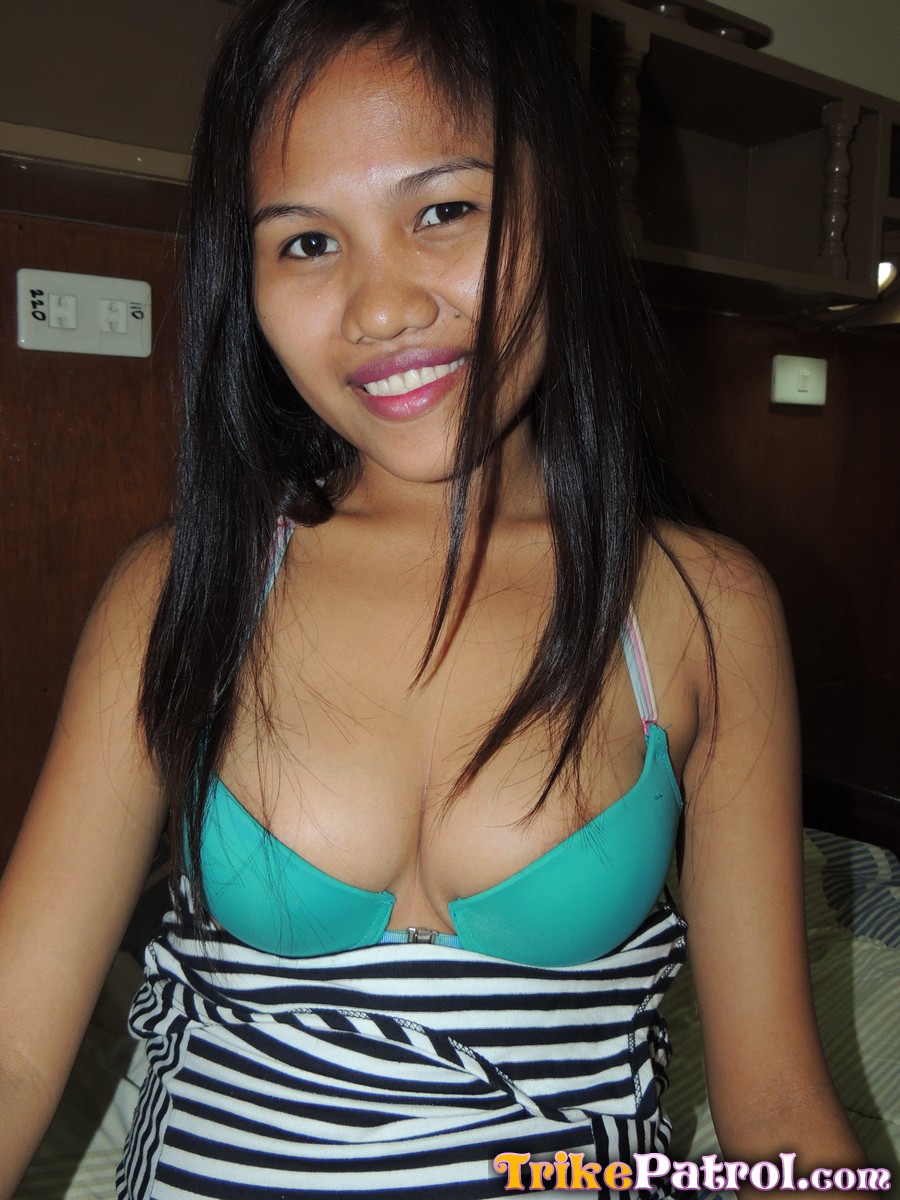 Filipina cutie shows off her boobs in a motel room for a sex tourist